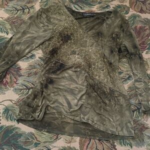 green embroidered top